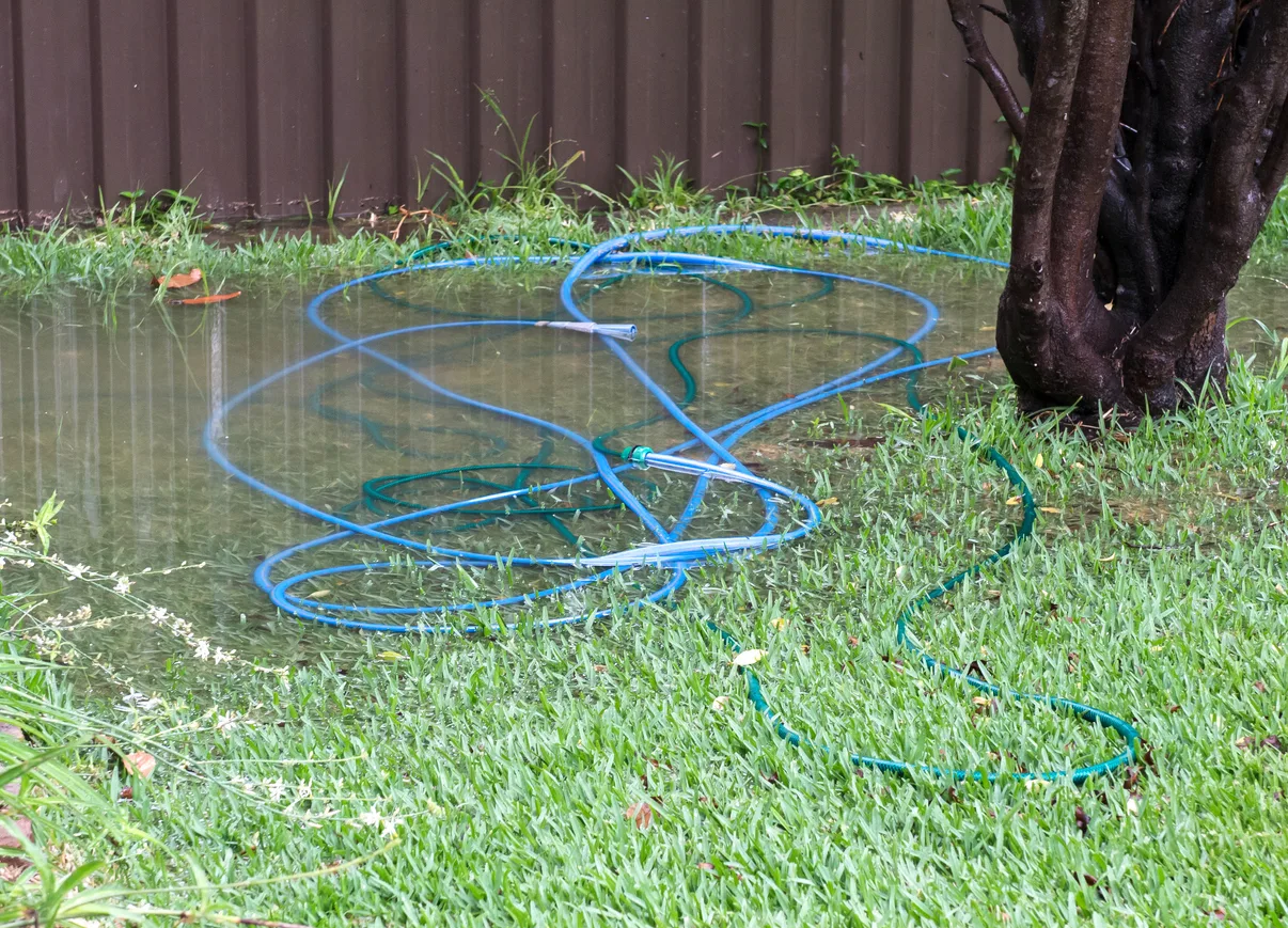 East Valley homeowner reviewing trenchless sewer repair options